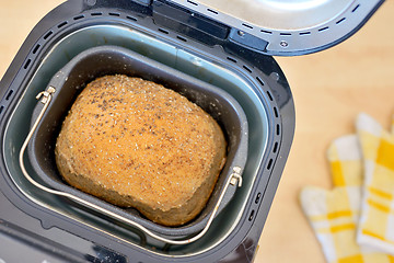 Image showing Bread machine  and fresh bread at home