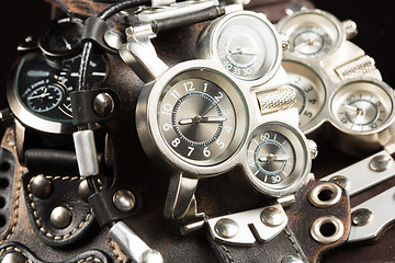 Image showing unusual watches. several alternatives dials