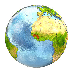 Image showing Guinea in red on full Earth