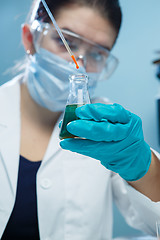 Image showing Girl in mask at lab