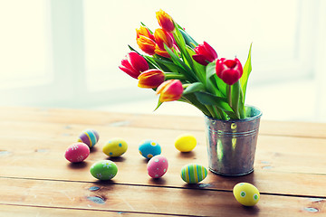 Image showing close up of easter eggs and flowers in bucket