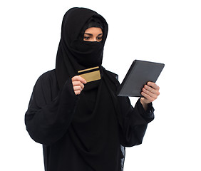 Image showing woman in hijab with tablet pc and credit card