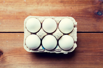 Image showing close up of white eggs in egg box or carton
