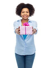 Image showing happy african woman with birthday gift box