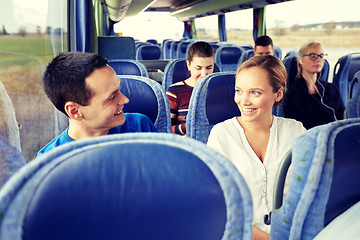 Image showing group of happy passengers in travel bus