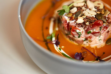 Image showing close up of vegetable pumpkin-ginger soup in bowl