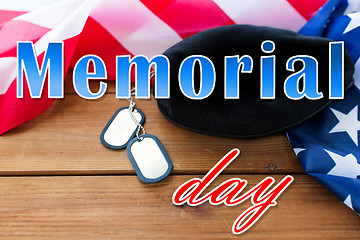 Image showing memorial day over american flag, hat and dog tag