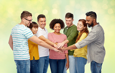 Image showing international group of happy people holding hands