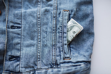 Image showing dollar money in pocket of denim jacket