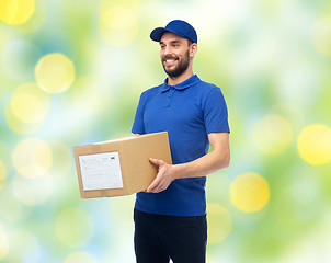 Image showing happy delivery man with parcel box