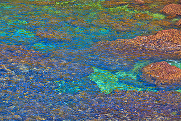 Image showing Rocky Coast Extending into the Sea