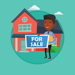 Image showing Real estate agent offering house.