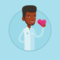 Image showing Doctor cardiologist holding heart.