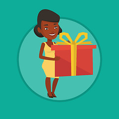 Image showing African-american woman holding box with gift.