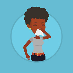 Image showing Young african-american sick woman sneezing.