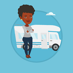 Image showing Woman standing in front of motor home.