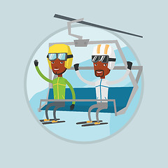 Image showing Two happy skiers using cableway at ski resort.