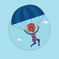 Image showing Young happy woman flying with parachute.