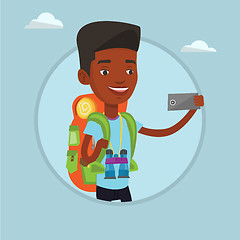 Image showing Man with backpack making selfie.