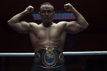 Image showing kick boxer with his championship belt