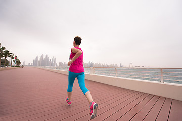 Image showing woman running on the promenade