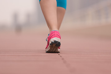 Image showing woman running on the promenade