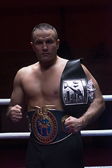 Image showing kick boxer with his championship belt