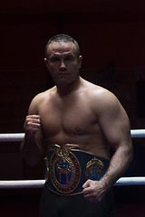 Image showing kick boxer with his championship belt