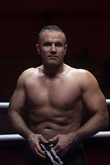 Image showing professional kickboxer in the training ring