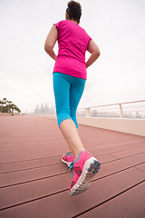 Image showing woman running on the promenade