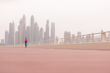 Image showing woman running on the promenade