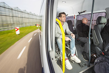 Image showing Disabled passenger in a taxi bus