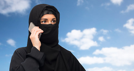 Image showing muslim woman in hijab over white background