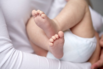 Image showing close up of newborn baby in mother hands