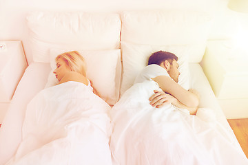 Image showing couple sleeping in bed at home