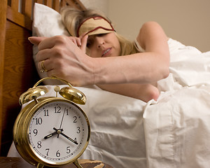 Image showing Woman and alarm clock