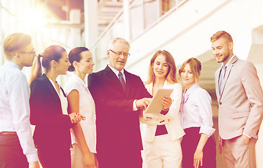 Image showing business people with tablet pc computer at office