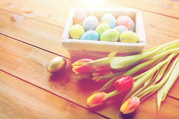 Image showing close up of colored easter eggs and flowers