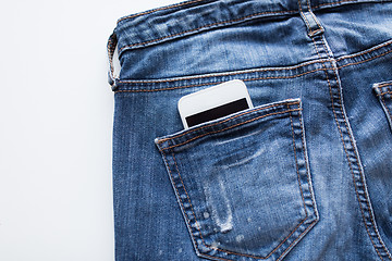 Image showing smartphone in pocket of denim pants or jeans