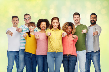 Image showing international group of people pointing on you