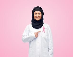 Image showing muslim doctor with breast cancer awareness ribbon
