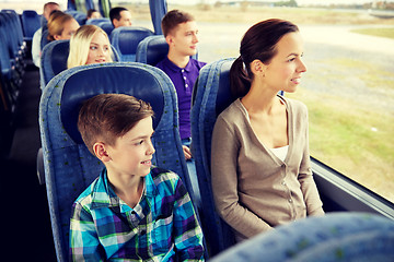 Image showing happy family riding in travel bus