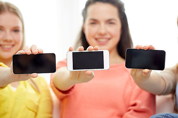 Image showing happy women or teenage girls with smartphones