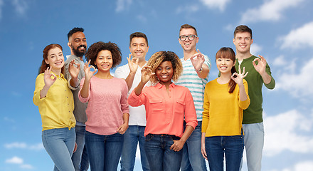 Image showing international group of happy people showing ok