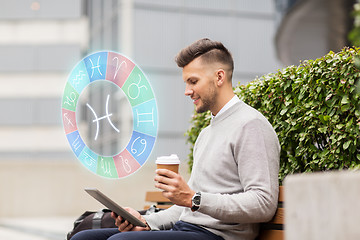 Image showing man with tablet pc and coffee in city