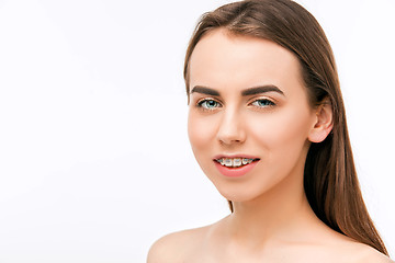 Image showing Beautiful young woman with teeth braces