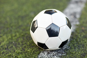 Image showing soccer ball on football field marking line