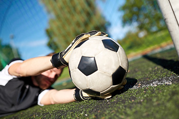 Image showing goalkeeper with ball at football goal on field