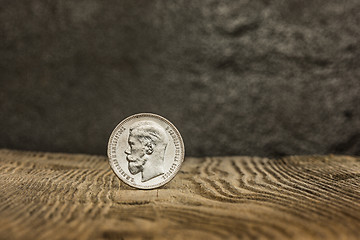 Image showing Closeup of old russian coin on a wooden background.