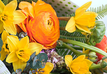 Image showing Ranunkulyus bouquet of red flowers on a white background